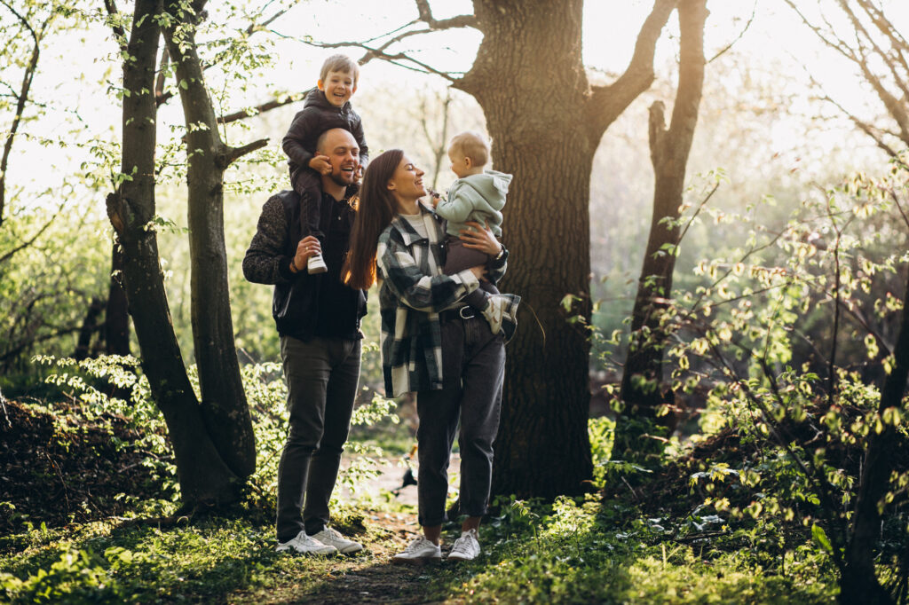 Family walking in nature in Circeo National Park near Sabaudia enjoying outdoor activities